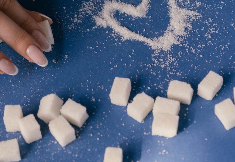 white sugar cubes on blue surface