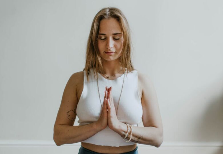 woman doing yoga inside a room