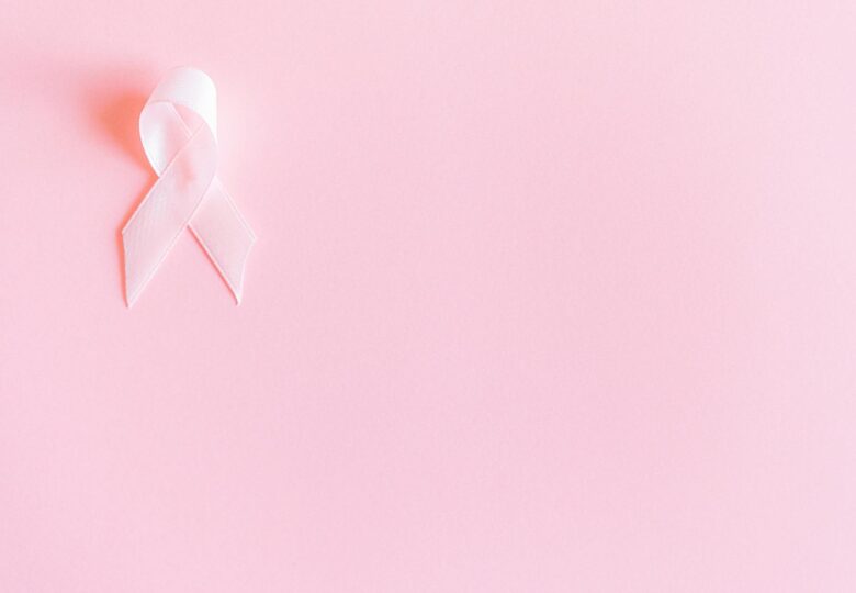 pink ribbon on pink surface