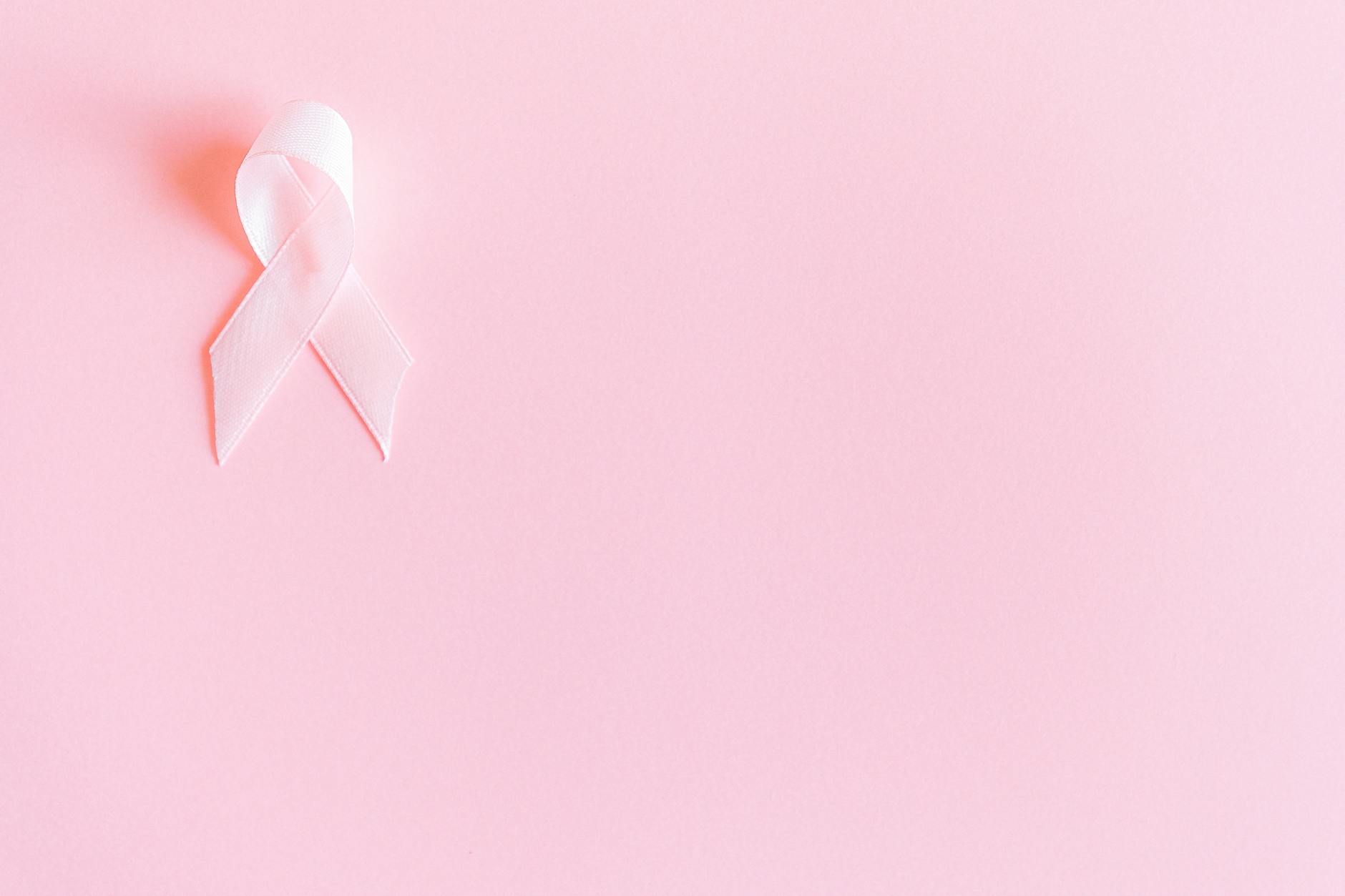 pink ribbon on pink surface